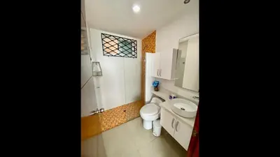 a small bathroom with a toilet and a sink at 2 Bedroom Beachfront Apartment 2P1-Al With Pool And WIFI in Cartagena de Indias