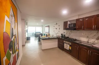 a kitchen with a sink and a stove at 2B/2B Gorgeous Sunsets-Ocean View -Pool in Cartagena de Indias
