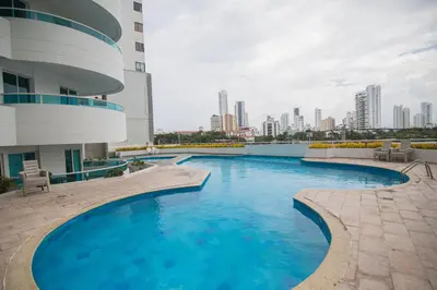 a swimming pool in the middle of a building at 2B/2B Gorgeous Sunsets-Ocean View -Pool in Cartagena de Indias