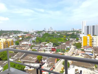 a view of a city from a balcony at Cómodo apartamento cerca al mar. in Cartagena de Indias