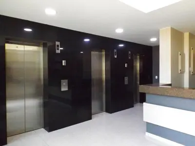 a elevator lobby with elevators in a building at Cómodo apartamento cerca al mar. in Cartagena de Indias