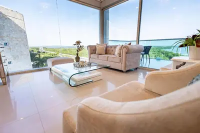 a living room with two couches and a table at Apartamento Morros 922 in Cartagena de Indias