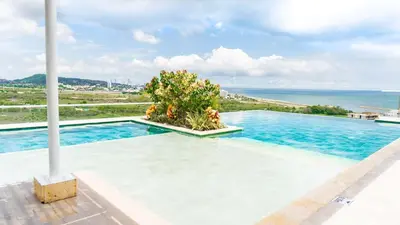 a swimming pool with a view of the ocean at DQ505 Nuevo hermoso jacuzzi priv in Cartagena de Indias