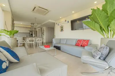 a living room with a couch and a table at MQ1206 | Lujo, vista y jacuzzi privado 2BD in Cartagena de Indias