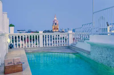 a swimming pool on the balcony of a building at Hotel Boutique Casa Córdoba Estrella in Cartagena de Indias