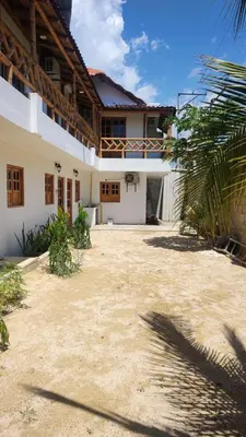 a house with a large yard in front of it at Cabañas en San Antero Bambumar2 in San Antero
