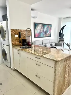 a kitchen with a sink and a microwave at MORROS EPIC Un refugio frente al mar in Cartagena de Indias