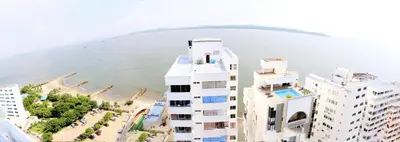 an aerial view of a building next to a beach at Apartment 1C19 Close To The Sea With Pool in Cartagena de Indias