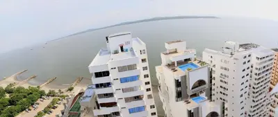 an aerial view of a building next to a beach at Studio Apartment E19C Close To The Sea And Pool in Cartagena de Indias