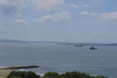 a large body of water with two boats in it at Apartamentos Bacanos in Cartagena de Indias