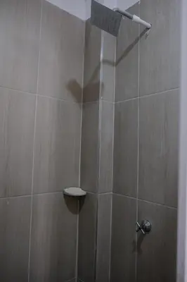 a shower with a glass door in a bathroom at Cabañas en San Antero Bambumar3 in San Antero