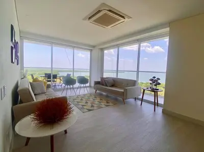 a living room with a couch and a table at MQ 1006 Cartagena, Playa cercana in Cartagena de Indias