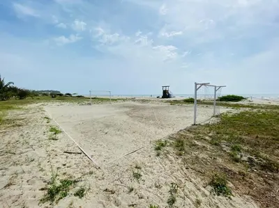 a volleyball net in the sand on the beach at ¡Wonderful Beach Loft! in Cartagena de Indias
