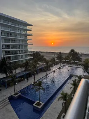 a view of a resort with a pool and the beach at Apartamento de lujo Morros ULTRA con vista y acceso directo al mar , Cartagena de Indias in Cartagena de Indias