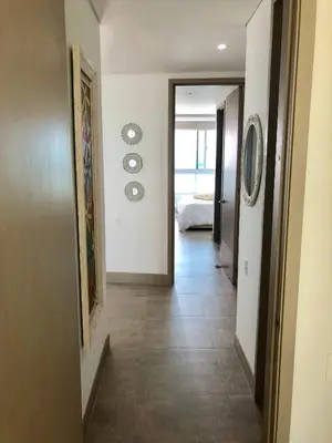 a hallway with a hallway leading to a bedroom at Apartamento Fantástico in Cartagena de Indias