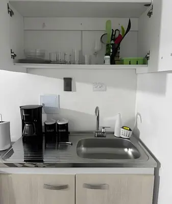 a kitchen with a sink and a counter top at Céntrico y confortable apto Casa Doña Yola 3 in Cartagena de Indias