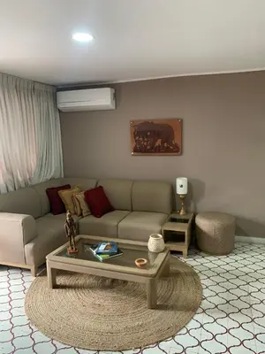 a living room with a couch and a coffee table at Apartahotel Edificio Baquero x5 Apto 301 in Barranquilla