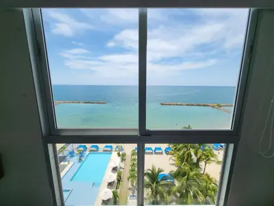 a window view of the ocean from a hotel room at Yellow beach & rest in Coveñas