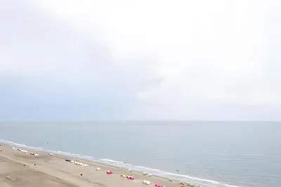 a beach with a lot of people and the water at 2 dormitorios Morros. Vista Panorámica y salida Playa in Cartagena de Indias