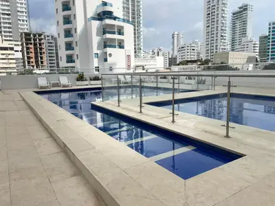 a swimming pool in a city with tall buildings at !Aprovecha Excelente Apartamento Para Vacacionar en Cartagena in Cartagena de Indias