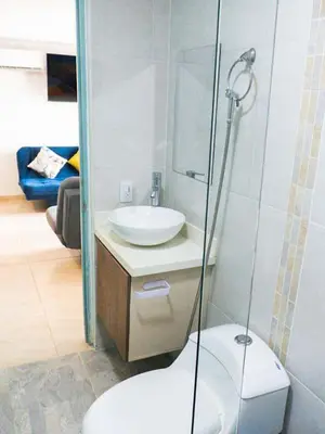 a bathroom with a toilet and a sink and a shower at Apartamento en la Boquilla in Cartagena de Indias