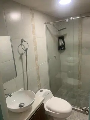 a bathroom with a shower and a toilet and a sink at Apartamento en la Boquilla in Cartagena de Indias