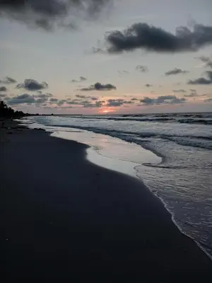 a view of a beach with the ocean at Hostal torres del caribe in San Bernardo del Viento
