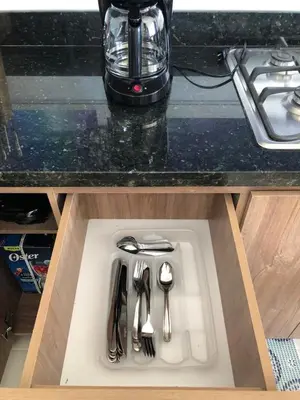 a sink in a counter with utensils on it at Casa Bita Morales CASA 101 in Las Canoas