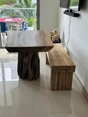 a wooden table and bench in a room at LUXURY APARTAMENT, MORROS ECO VISTA AL MAR. in Cartagena de Indias