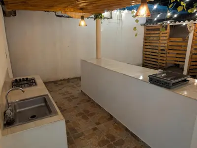 a kitchen with a sink and a counter top at Casa perla in Cartagena de Indias