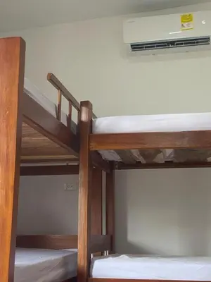 a couple of bunk beds in a room at Cabañas Paulamar - Apto 4 - Tolú in Santiago