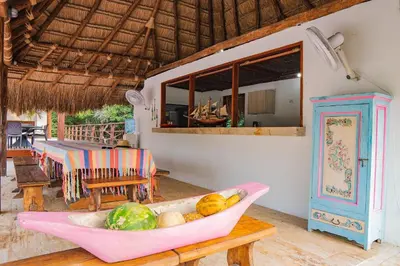 a bowl of fruit sitting on a table in a room at U-GO Espectacular Casa en Barú con Vistas al Mar in Cartagena de Indias