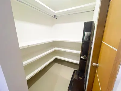an empty room with a door leading into a room at Apartamento Arenita de mar in Coveñas