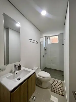 a bathroom with a sink and a toilet and a shower at Moderno y amplio apartamento cerca a la playa! in Cartagena de Indias
