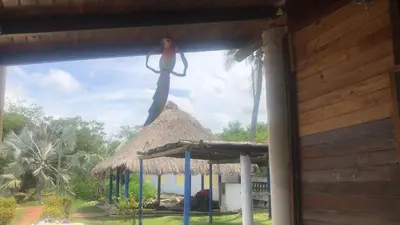 a statue of a woman on top of a hut at SiÉ Cabaña en Coveñas cerca a la playa in Coveñas