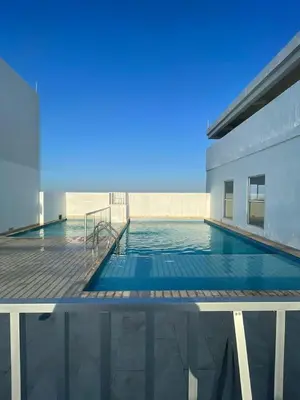 a swimming pool on the roof of a building at Nice Apartment close to Historic City and beach in Cartagena de Indias