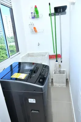 a stove in a tiny kitchen with a window at Excelente ubicación y cómodo apto, perfecto para ti! in Barranquilla