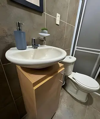 a bathroom with a sink and a toilet at Céntrico y confortable apto casa Doña yola 5 in Cartagena de Indias