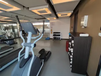 a room with a gym with a treadmill at Holiday Inn Express - Cartagena Bocagrande by IHG in Cartagena de Indias