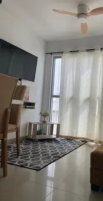 a living room with a table and a window at Apartamento Cerca Playa Marbella in Cartagena de Indias