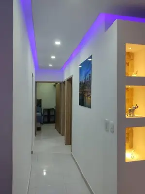 a hallway with a purple ceiling in a room at Apto TORRE PRIMI - Cerca al mar in Cartagena de Indias