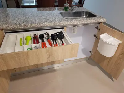a kitchen counter with a drawer full of kitchen utensils at Apartamento cerca al Mar in Cartagena de Indias