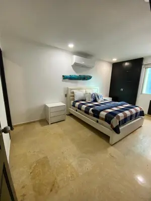 a bedroom with a bed in a white room at YOLO solo se vive una vez - MORROS Cartagena in Cartagena de Indias