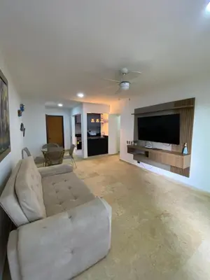 a living room with a couch and a flat screen tv at YOLO solo se vive una vez - MORROS Cartagena in Cartagena de Indias