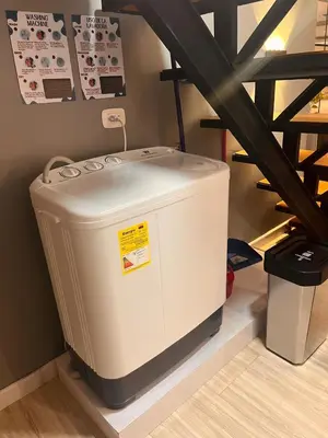 a white cooler sitting on a shelf in a room at ¡La mejor Suite! Lujo, ubicación, precio in Barranquilla