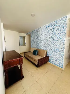 a room with a bed and a desk in it at APTO 802 VISTA AL MAR in Cartagena de Indias