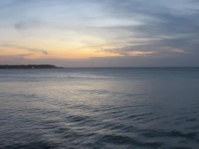 a view of the ocean at sunset at Magia frente al Mar Caribe in Cartagena de Indias