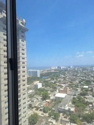 a view of a city from the window of a building at AQUALINASTAR in Cartagena de Indias