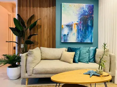 a living room with a couch and a painting at 2-2 Palmetto Eliptic 3403 Enchanted Jewel in Cartagena de Indias