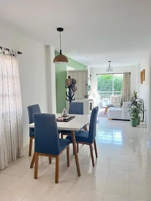 a kitchen and dining room with a table and chairs at Northwest Hostings 201 in Cartagena de Indias